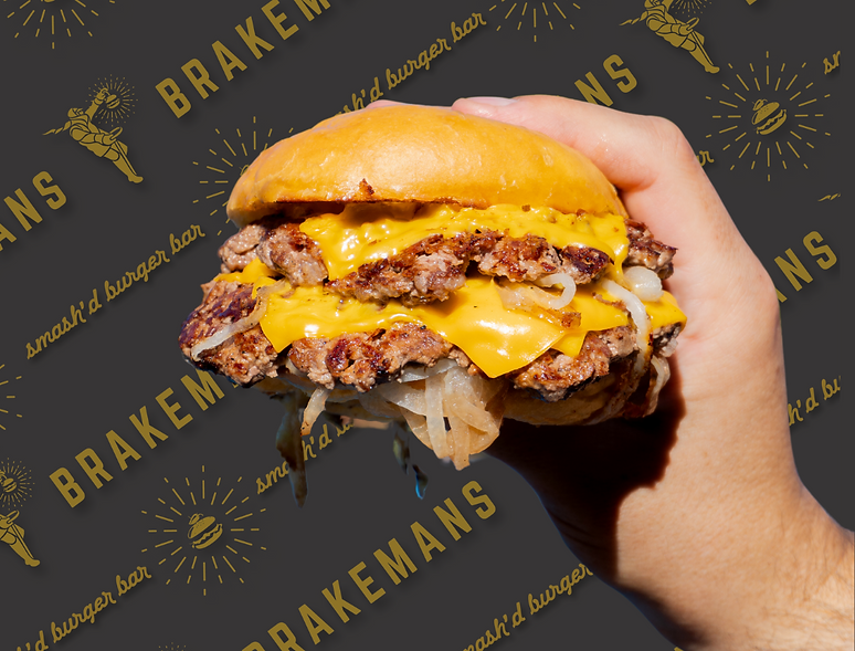 Wagyu smash burger held up